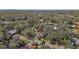 Aerial view of the home and neighborhood, highlighting its location at 1116 N Riverhills Dr, Temple Terrace, FL 33617