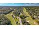 Aerial view of the neighborhood and golf course at 1116 N Riverhills Dr, Temple Terrace, FL 33617