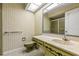 Bathroom with large vanity, shower, and vintage green tile at 1116 N Riverhills Dr, Temple Terrace, FL 33617