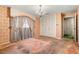 Bedroom with double closets, patterned wallpaper and a chandelier at 1116 N Riverhills Dr, Temple Terrace, FL 33617