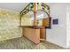 Unique wet bar with stained glass and wood finishes at 1116 N Riverhills Dr, Temple Terrace, FL 33617