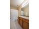 Bathroom with shower/tub combo, wood vanity, and a patterned shower curtain at 12303 Foxmoor Peak Dr, Riverview, FL 33579