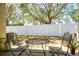 Small patio with metal table and chairs, offering a relaxing outdoor space at 12303 Foxmoor Peak Dr, Riverview, FL 33579