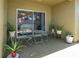 Relaxing patio with seating area, potted plants, and view of interior at 12303 Foxmoor Peak Dr, Riverview, FL 33579
