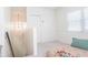 Cozy bedroom with white walls and a window at 14324 Moon Flower Dr, Tampa, FL 33626