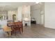 Inviting dining area connected to the kitchen and living room with ample natural light at 14324 Moon Flower Dr, Tampa, FL 33626
