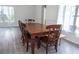 Charming dining area with a wooden table set, perfect for Gathering meals and gatherings at 14324 Moon Flower Dr, Tampa, FL 33626