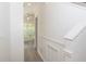 Hallway with hardwood flooring and bright natural light at 14324 Moon Flower Dr, Tampa, FL 33626