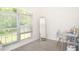 Office room featuring lots of natural light and hardwood flooring at 14324 Moon Flower Dr, Tampa, FL 33626