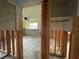 View of a bedroom under construction; walls and flooring are incomplete at 2155 Edythe Dr, Dunedin, FL 34698