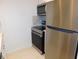 Stainless steel appliances including microwave and range at 2460 Enterprise Rd # 3, Clearwater, FL 33763