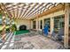 Outdoor patio with pergola and backyard access at 2640 Westchester N Dr, Clearwater, FL 33761