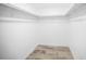 Spacious walk-in closet with ample shelving and storage space at 2640 Westchester N Dr, Clearwater, FL 33761