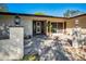 Welcoming front entrance with decorative columns, stone walkway, and stylish lighting at 2640 Westchester N Dr, Clearwater, FL 33761