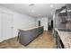 Bright kitchen features granite counters, a large island with seating and stainless appliances at 2640 Westchester N Dr, Clearwater, FL 33761