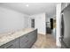 This stylish kitchen features a large island, granite countertops, and stainless steel appliances at 2640 Westchester N Dr, Clearwater, FL 33761