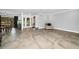 Spacious living room with large format tile flooring at 2640 Westchester N Dr, Clearwater, FL 33761