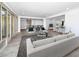 Open floorplan living room featuring an eat-in kitchen with easy access to other living spaces at 2640 Westchester N Dr, Clearwater, FL 33761