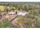 Aerial view of home, carport, and driveway at 302 E Keysville Rd, Plant City, FL 33567