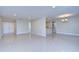 Open living room with tile flooring and natural light at 3223 Sandspur Dr, Tampa, FL 33618