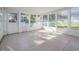 Sunroom with tile floors and plenty of natural light at 35608 Welby Ct, Zephyrhills, FL 33541