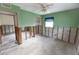 Bedroom under renovation, showing exposed framing and cinder block walls at 3781 Belle Vista E Dr, St Pete Beach, FL 33706