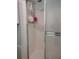 Clean shower stall with glass enclosure and storage at 4634 Lake Blvd, Clearwater, FL 33762