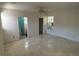 Spacious bedroom with tile flooring and an ensuite bathroom at 6035 Grand Blvd, New Port Richey, FL 34652