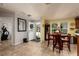 Bright dining area with wood table and chairs at 703 Old Charleston Way, Largo, FL 33770