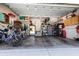 Spacious garage with overhead storage and ample room for two vehicles at 703 Old Charleston Way, Largo, FL 33770
