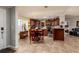 Kitchen with island, stainless steel appliances, and wood cabinets at 703 Old Charleston Way, Largo, FL 33770