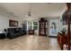 Spacious living room with tiled floors and lots of natural light at 703 Old Charleston Way, Largo, FL 33770