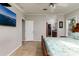 Main bedroom with ensuite bathroom access and large closet at 703 Old Charleston Way, Largo, FL 33770