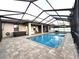 Enclosed pool with spa and screened enclosure at 735 Challice Dr, Spring Hill, FL 34609