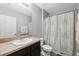 Simple bathroom with shower/tub, toilet and vanity at 9868 Hound Chase Dr, Gibsonton, FL 33534