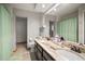 Bathroom with a double vanity and granite countertops at 11201 Kerry Hills Ct, Riverview, FL 33569