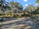 Single-Gathering home with mature landscaping and large oak trees at 11201 Kerry Hills Ct, Riverview, FL 33569