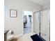 Clean bathroom with a walk-in shower, toilet and spacious closet at 11409 Drifting Leaf Dr, Riverview, FL 33579