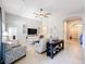 Open concept living room with views of the entryway and hallway at 11409 Drifting Leaf Dr, Riverview, FL 33579