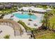 Stunning community pool with a covered seating area, perfect for relaxing and entertaining at 11409 Drifting Leaf Dr, Riverview, FL 33579