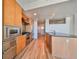 Modern kitchen featuring stainless steel appliances and light wood cabinets at 1208 E Kennedy Blvd # 725, Tampa, FL 33602