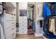 Well-organized walk-in closet with built-in shelving and drawers at 12306 Woodlands Cir, Dade City, FL 33525