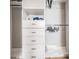 Organized closet with drawers, shelves, and hanging space maximizes storage in style at 12306 Woodlands Cir, Dade City, FL 33525