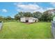 Large backyard with detached workshop and fenced perimeter at 13810 Walden Sheffield Rd, Dover, FL 33527