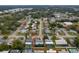 High-angle view of a single-Gathering home situated amongst other homes in a residential area at 1480 Santa Monica Dr, Dunedin, FL 34698