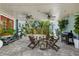 Covered patio with seating area and ceiling fans at 151 18Th Ne Ave, St Petersburg, FL 33704