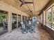 Relaxing covered patio area with seating for residents at 1901 Lennox E Rd # 1901, Palm Harbor, FL 34683