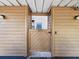 Private entrance gate with the address '1901' leading to the property at 1901 Lennox E Rd # 1901, Palm Harbor, FL 34683
