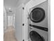 Laundry room with stacked LG washer and dryer at 1913 W North A St # 1, Tampa, FL 33606