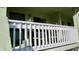 View of a condo balcony with white railings at 20853 Haulover Cv # A8, Lutz, FL 33558